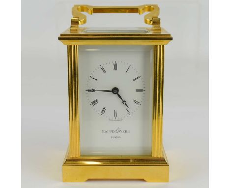 MAPPIN &amp; WEBB, LONDON; a brass cased carriage clock, the white dial set with Roman numerals, key wind movement, glazed to