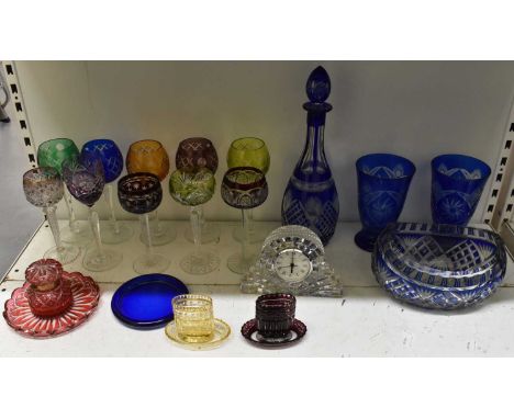 WATERFORD; a crystal glass timepiece, width 18cm, height 18cm, a large blue cut glass decanter and matching bowl, two blue cu