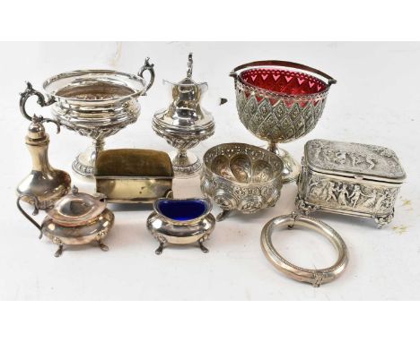 A small quantity of silver plated items including a twin handled sugar bowl and matching cream jug, silver plated basket with