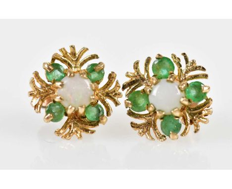 A pair of 9ct yellow gold emerald and opal floral designed ear studs, approx 1.7g.Qty: 1