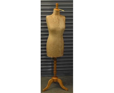 A 19th century adjustable mannequin on tripod base, height 161cm.