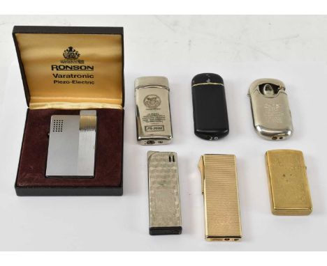 A group of lighters including cased Ronson lighter, Zippo lighter, Ronson gold plated lighter inscribed 'J R', also four othe