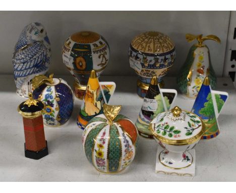 ROYAL WORCESTER; a collection of eleven assorted candle snuffers. 