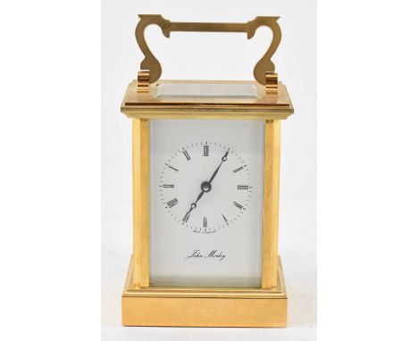 JOHN MORLEY; a modern brass cased carriage clock with handle to top, height to top of handle 15cm, width 8cm. 