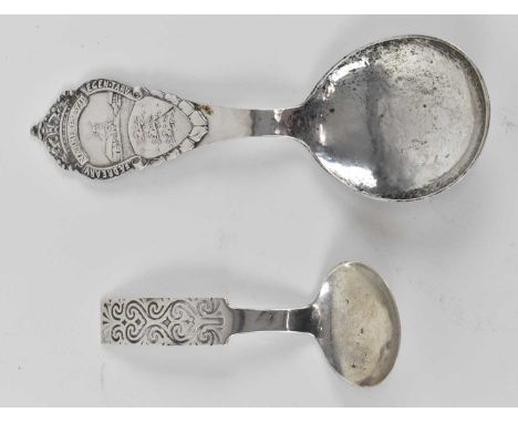 A Norwegian hallmarked silver caddy spoon, length 18.5cm, and an 830 grade hallmarked silver caddy spoon, length 12.5cm, comb