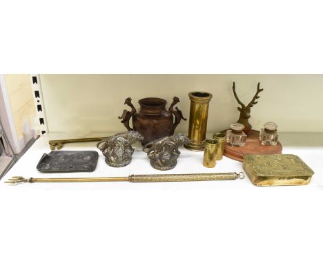 A group of collectors' items including a bronzed twin handled censer, two bronzed plaster lions, inkwell with model of a deer