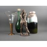 A mottled glass dolphin, three paperweights, four decanters, a glass lantern, a collection of