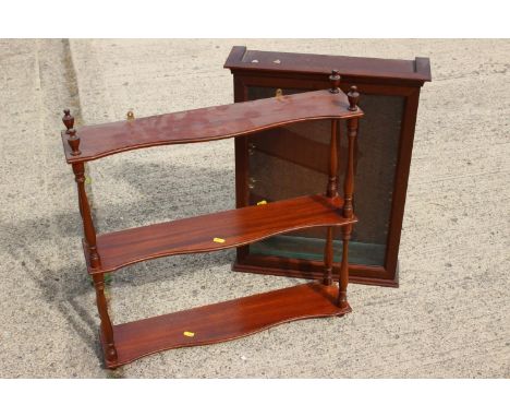 A mahogany three-tier open wall shelf, 24" wide x 5" deep x 18" high, a mahogany display cabinet enclosed glazed door, 18" wi