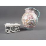 A Bursley ware tube lined jug, by Charlotte Rhead, and a similar rectangular trinket box and cover