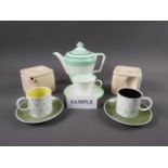 Two Cunard White Star cube teapots, a Paragon bone china teapot, three matching cups and saucers,