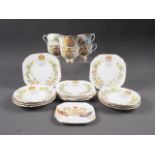 A 1953 Coronation part tea service for six and a similar spoon dish