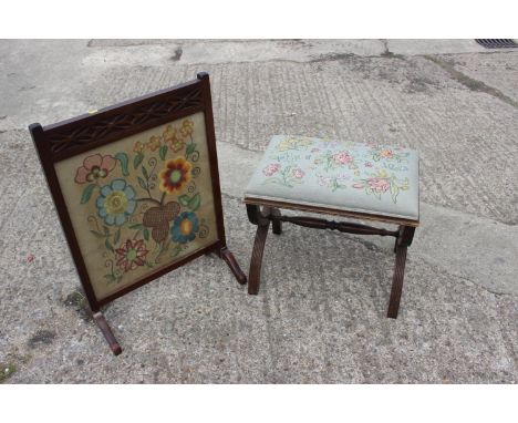 A reeded mahogany ‘X’ frame stool with needlepoint seat, 21" wide x 16" deep x 18" high, and a mahogany framed firescreen wit
