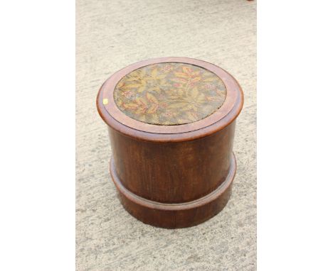 A circular mahogany commode stool with needlepoint seat, 15" dia x 15 1/2" high