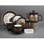 A Derby "Arabesque" pattern part combination service, including a teapot, coffee pot, dinner plates,