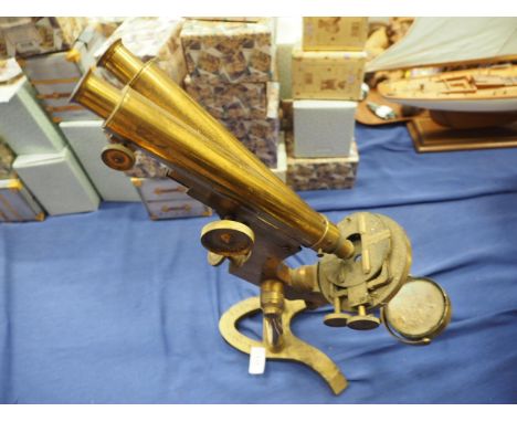 A 19th century Ross brass binocular microscope, on stand number 5380, 19 1/2" high (requires cleaning and some restoration)