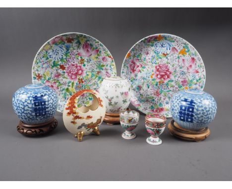 A pair of Chinese famille rose millefiori plates, 9 1/2" dia, a pair of blue and white ginger jars and covers, on stands, a s