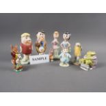 A set of porcelain Flintstone figures, four Beswick Peter Rabbit figures and other ornamental items
