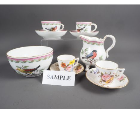 A Meissen part tea and coffee service with central bird decoration and pink borders (damages), and a pair of Derby coffee cup