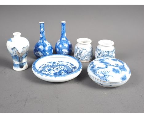 A Chinese blue and white dish with dragon and cloud decoration, seal mark to base, 4” dia, a blue and white scent bottle with