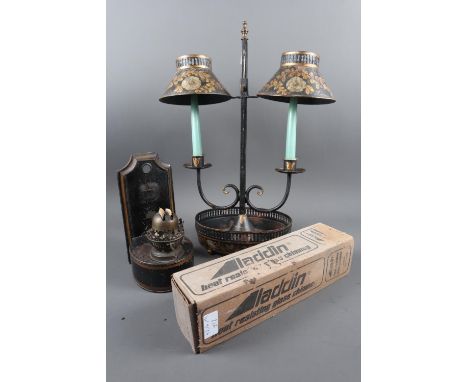 A student’s 19th century toleware two-light table lamp, 20" high, and a black Japanned wall mounted oil lamp with chimney