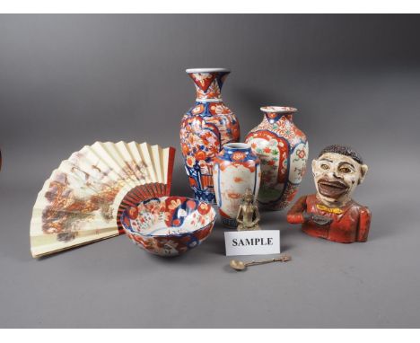 A selection of Oriental Imari decorated ceramics, a Satsuma vase, a Chinese black cloisonne enamel vase, and various other Or