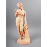 After Thorwaldsen: a 19th century terracotta figure of Venus with an apple, stamped P Ipsen