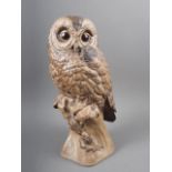 A Poole pottery brown glazed model of an owl, by B Linley-Adams, 12 1/2" high