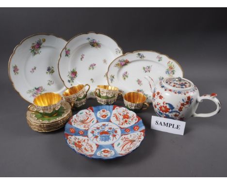 A 19th century part dinner service with floral spray decoration, a Chinese teapot with blue and red floral decoration (damage