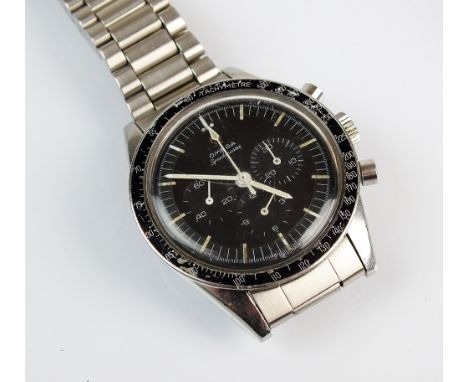 A Gentleman's Omega stainless steel Speedmaster Chronograph wristwatch, manual wind, with attached Omega stainless steel brac