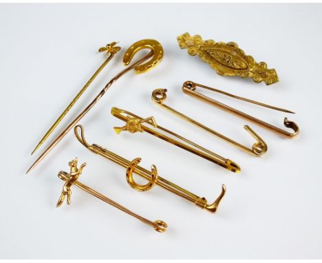 A collection of various bar brooches and pins, comprising; three hunting and riding related examples, stamped '9ct', a horses