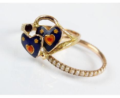 An entwined double heart enamel ring, size K, together with a split seed pearl eternity ring, size M, total weight 2.9gms (2)