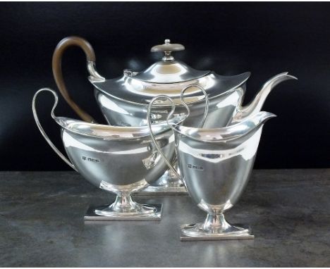 A three piece silver tea service, Fenton Brothers Ltd, Sheffield 1916, each piece of plain polished oval form, comprising; a 