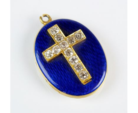 A Victorian diamond and enamel mourning locket, the oval blue enamel locket mounted with mine cut diamond set cross, the reve