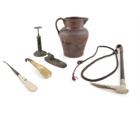 AN ASSORTED COLLECTION comprising; a leather and horn mounted riding crop, shoe horn, ivory button back, bronze salter scales