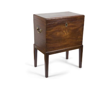 A GEORGE III MAHOGANY CELLARETTE, with inset brass inscription panel Lambert & Rawlings, 11 & 12 Coventry Street London, Silv