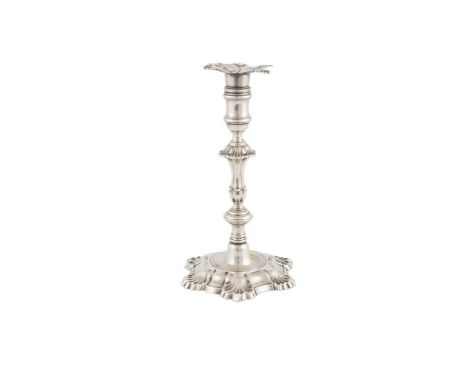 AN IRISH GEORGE II SILVER CANDLESTICK, Dublin c.1740, mark of Robert Calderwood, the detachable sconce with scallop shell poi