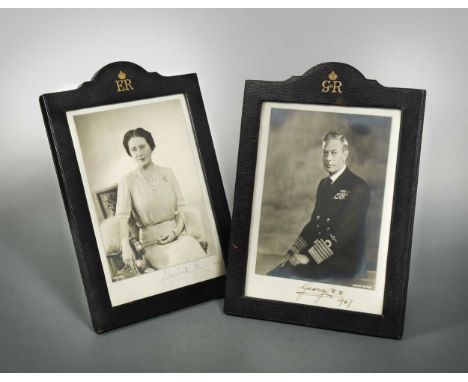 Dorothy Wilding, a pair of portrait photographs of King George VI and Queen Elizabeth, signed below in ink 'George R.I. 1947'