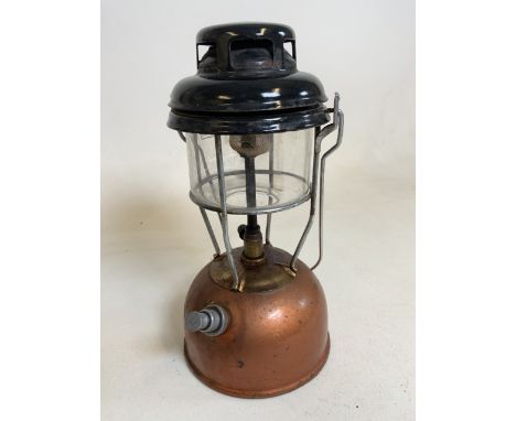 A copper and brass Tilley lamp with original Tilley glass shade. H:34cm