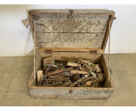 A vintage tool box with masonry chisels and other tools etc. 