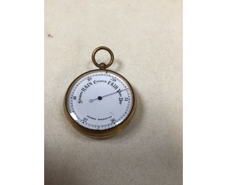 A brass aneroid pocket barometer W:5cm 