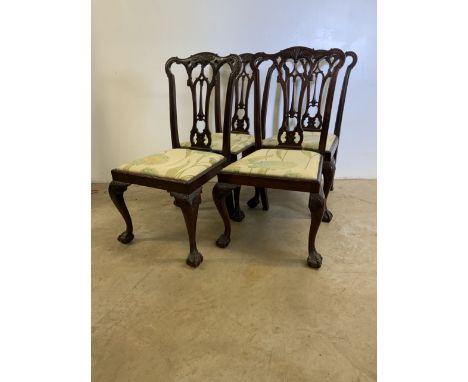 A set of four chippendale style good quality reproduction dining chairs with ball and claw feet. Seat height H:46cm