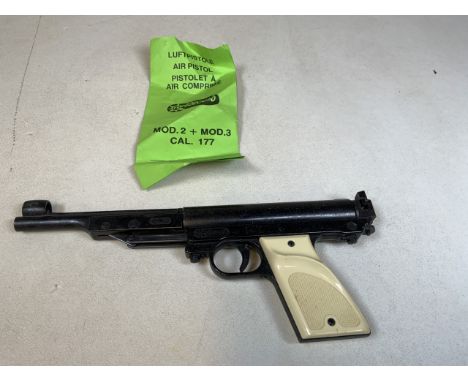 A Record air pistol .177 Calibre, made in West Germany. No box but with instruction leaflet W:29cm