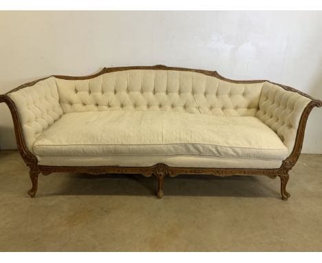 A French style button back salon sofa with carved details. W:210cm x D:88cm x H:86cm