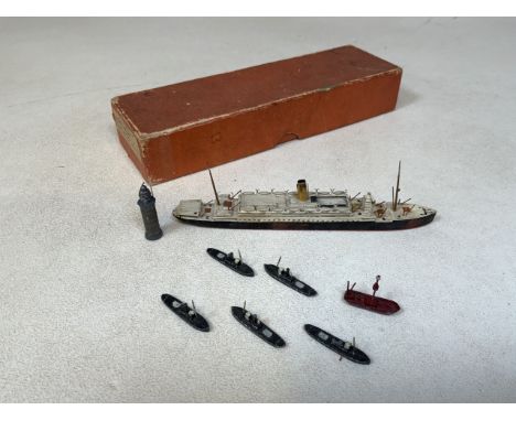A boxed waterline Model Ship Almanzora with metal light house and 6 other boats W:15cm 