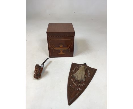 A cube tea caddy with inlaid decoration to the front, also with a carved pipe A/F and a taxidermy Bucks Otter Hounds dated 19