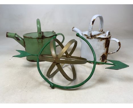 A green and gold armillary garden sun dial (A.F no base) also with two enamel watering cans. 