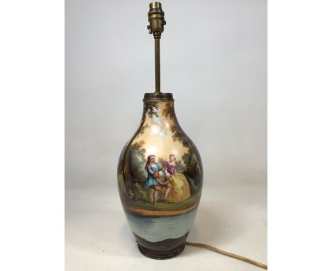 A hand painted lamp base of a pastoral scene W:18cm x H:51cm 