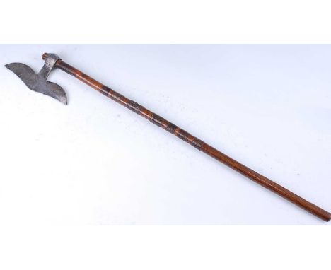A Bulova war axe, having a typical shaped blade with engraved decoration, on a rattan bound hardwood haft, India, 19th centur