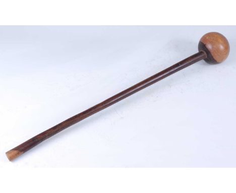 A South African iron wood knobkerrie, having a typical spherical head and plain handle, Zulu People, Natal, early 20th centur