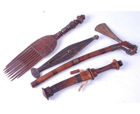 * Tchokwe and West Africa, a Tchokwe axe, having a flattened blade with incised and dot decoration, the wire bound shaft with